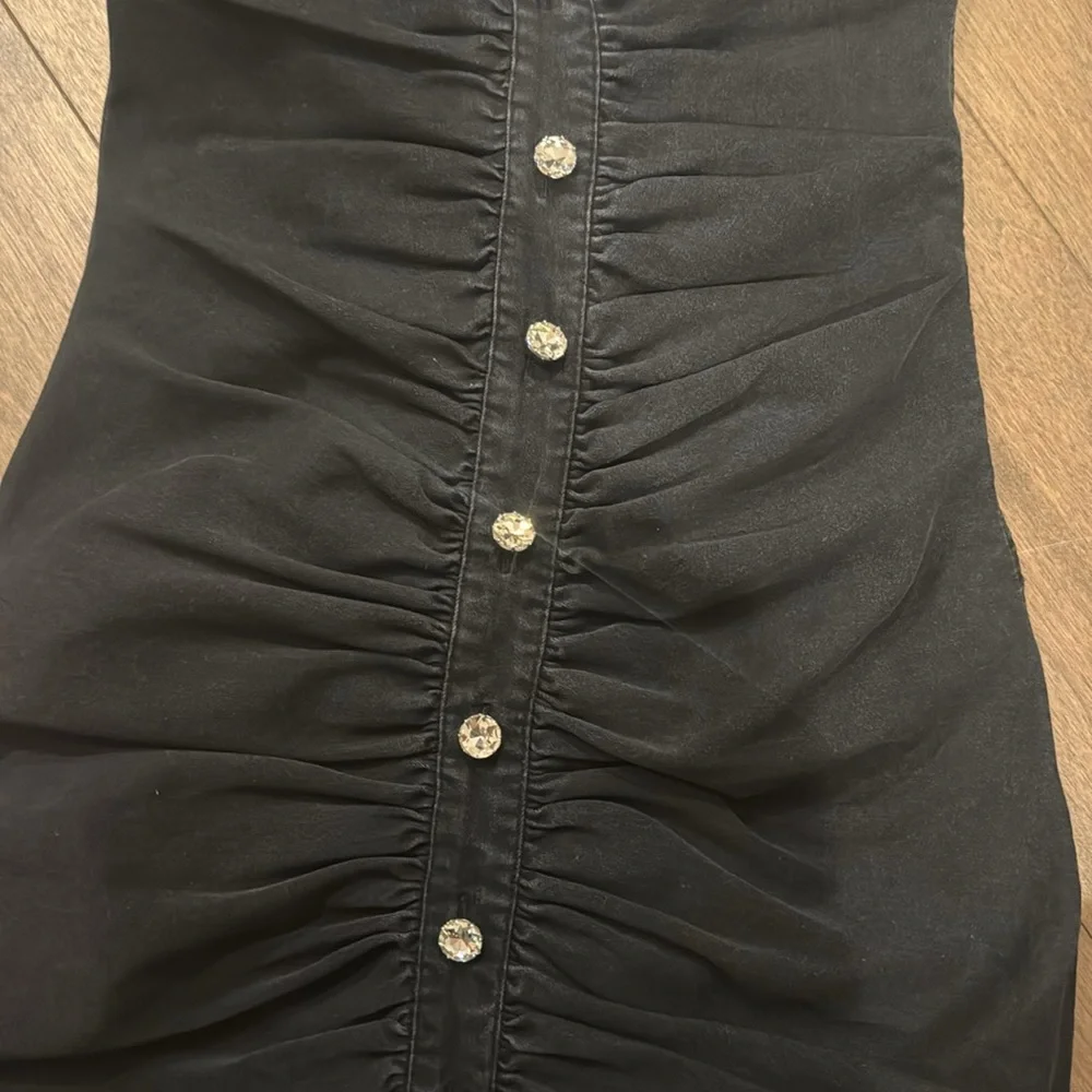 Retrofete Black Strapless Ruched Mini Dress with Rhinestone Buttons